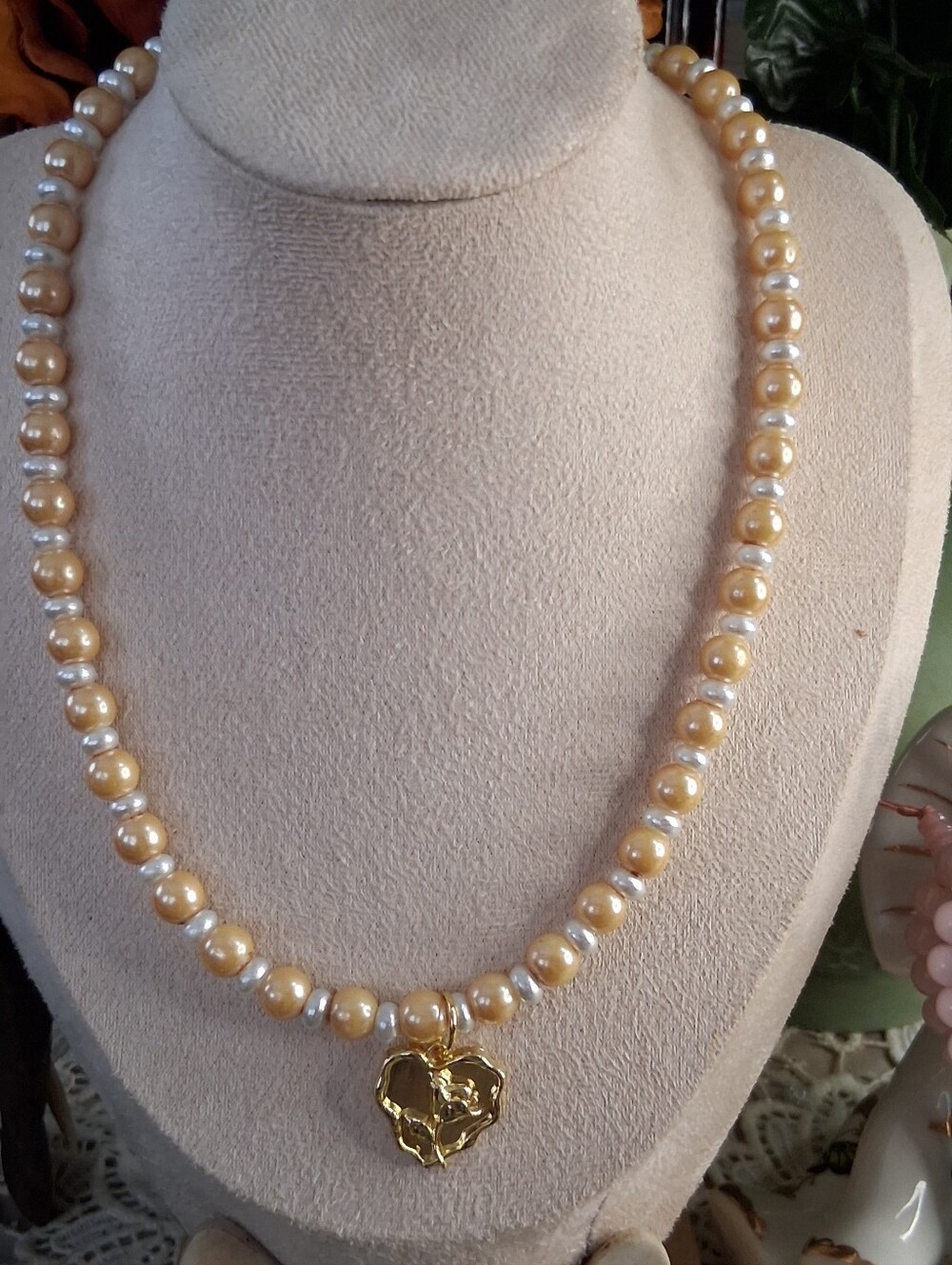 Elegant Gold-Tone Peach Pearl Necklace with Heart Charm